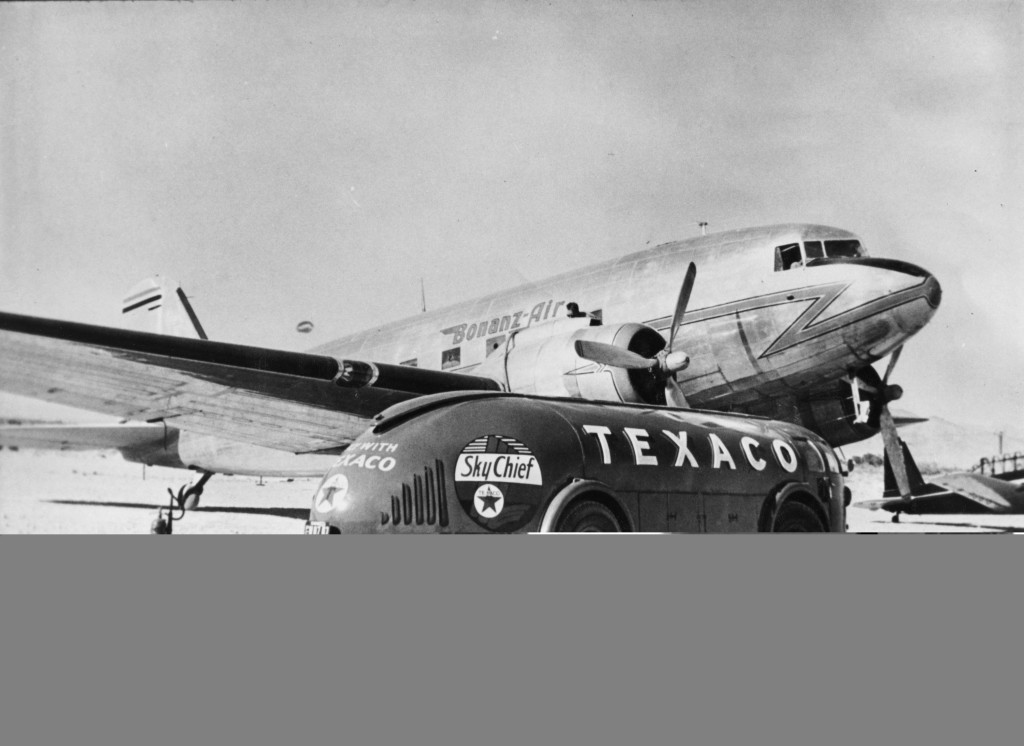 Bonanaza Airlines DC-3 with Bonanz-Air livery at Alamo Airport, Texeco "ddoodlebug" fuel truck in front, c. 1946.